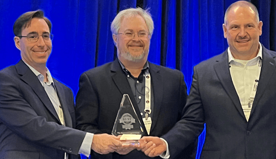 Raymond representatives accept Industryweek best plants award, October 2022 